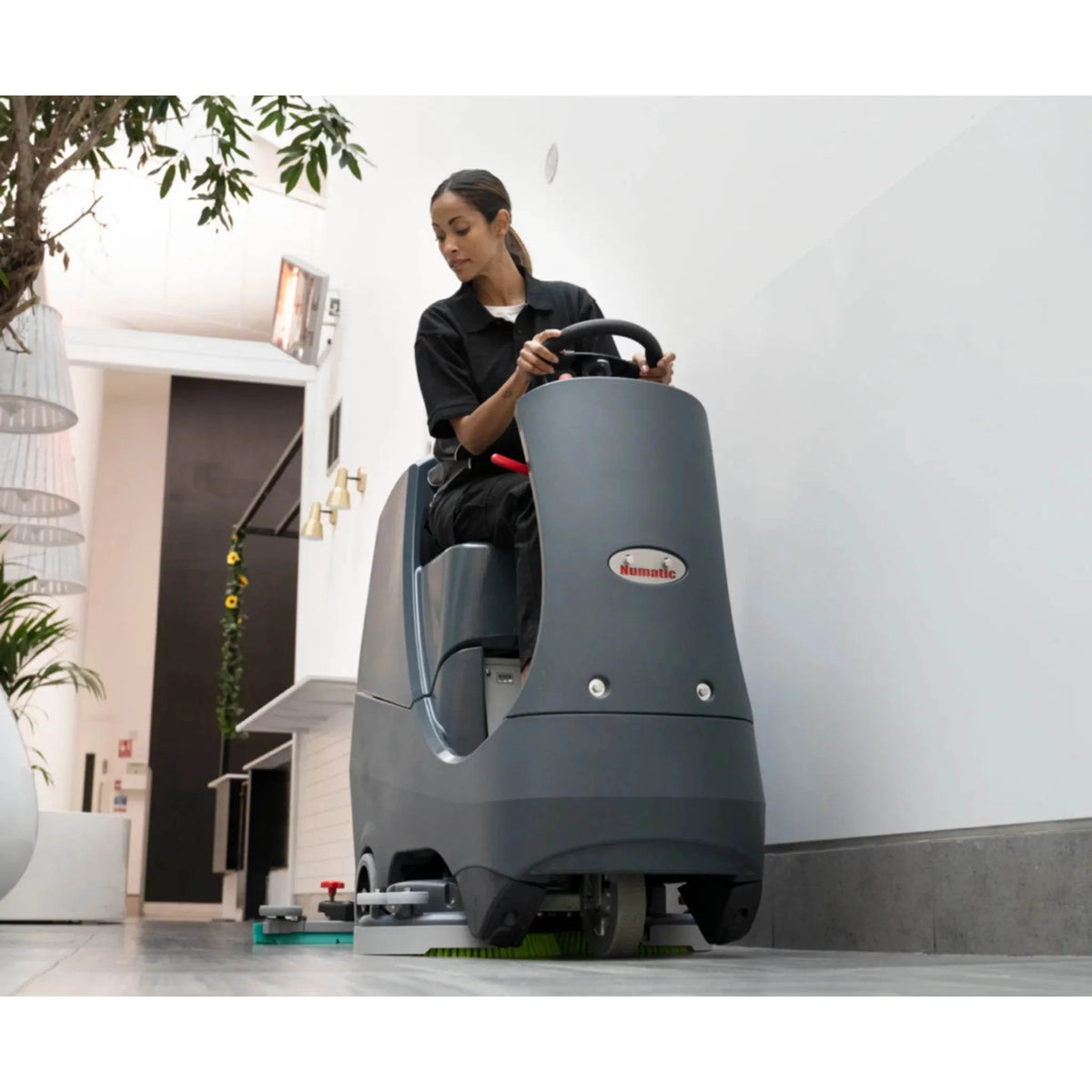 NaceCare CRL 2128/100T Ride-On Floor Scrubber K-916888-C2B - in use