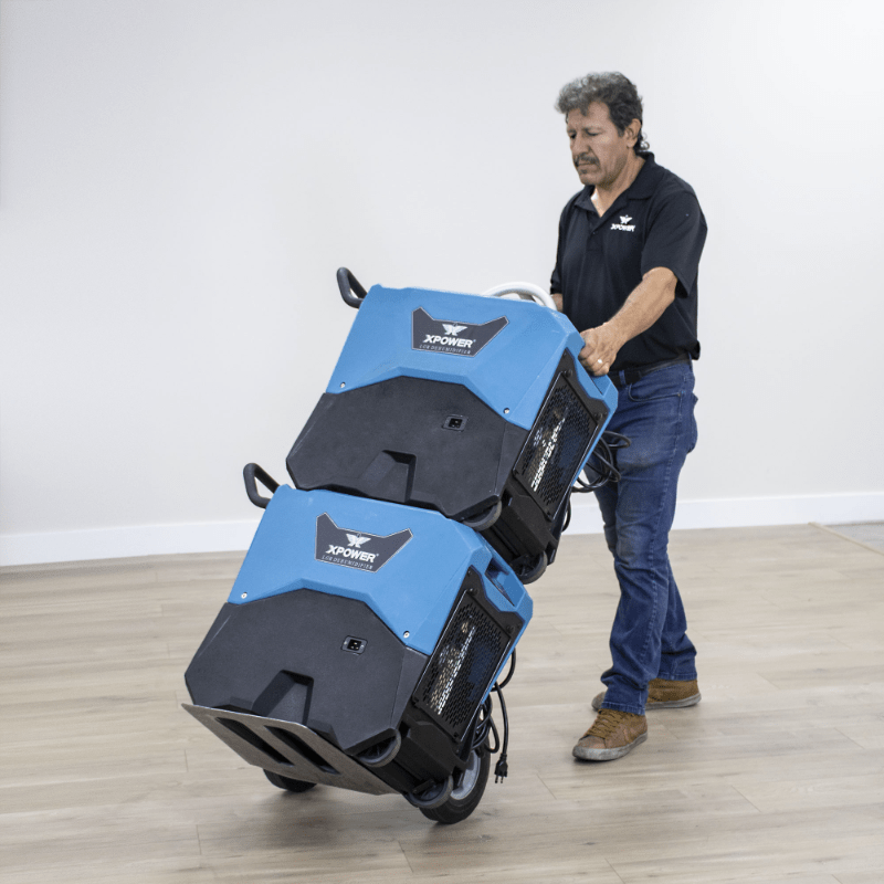 XPOWER LGR commercial dehumidifier XD-85L2 - blue, in use on a job site, view 2